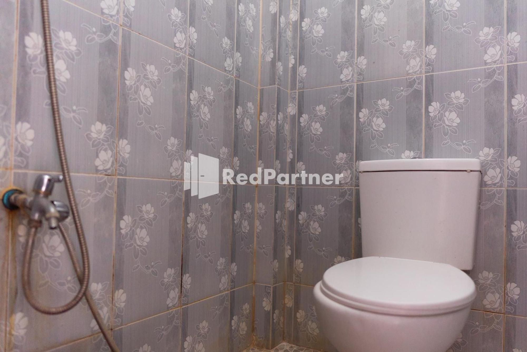 Pondok Kelapa Homestay Lampung Mitra Reddoorz バンダールランプン 部屋 写真